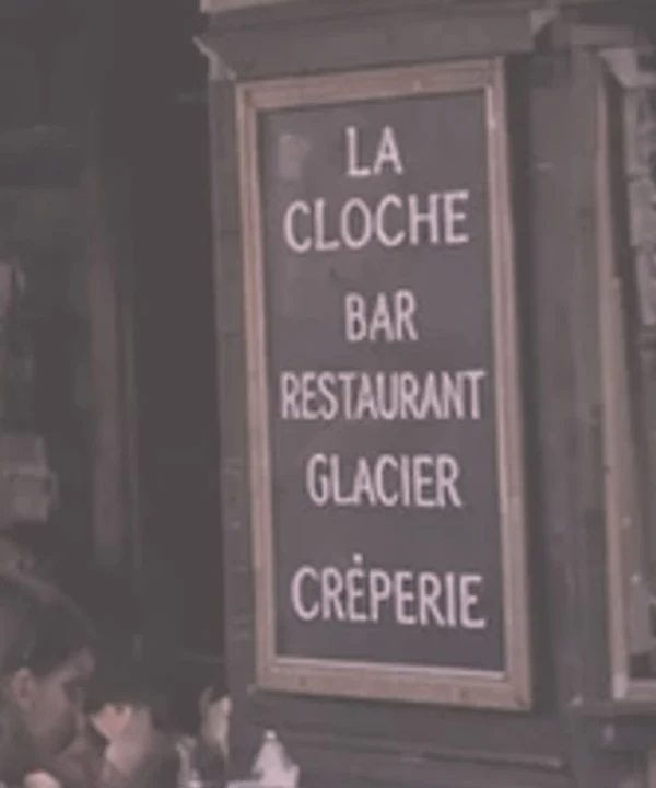 Crop of a faded scan of a café sign reading La Cloche, Bar, Restaurant, Glacier, Crêperie