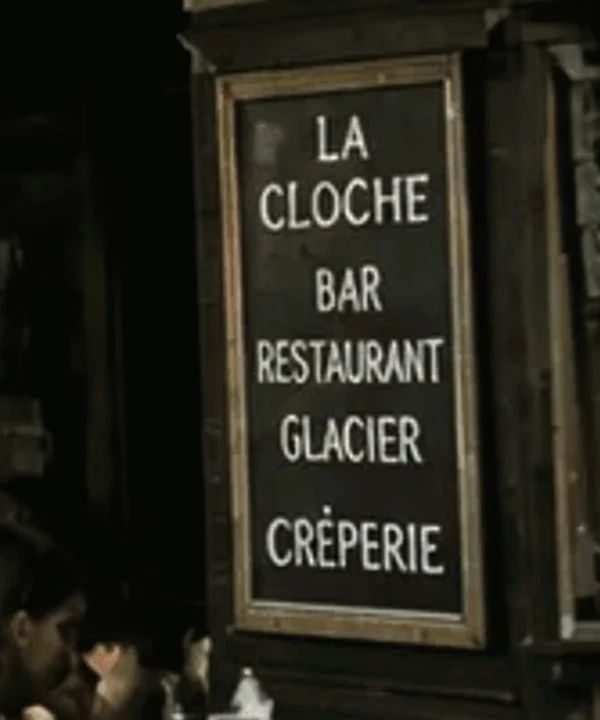 The same sign after batch color correction: colors restored, every letter unchanged